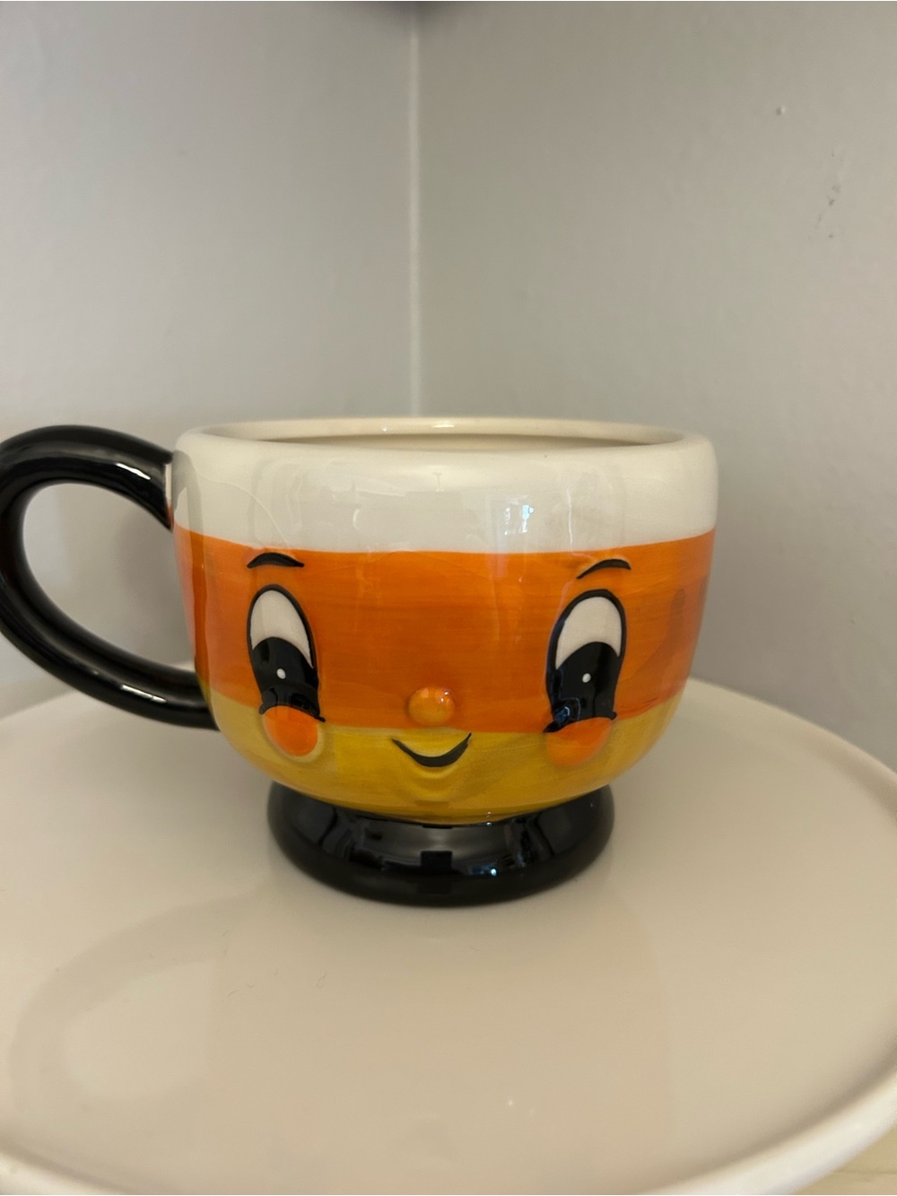 Cute Orange Candy Corn Face Ceramic Mug with Black Handle